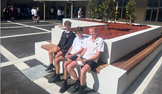 Students enjoying new Q-Block courtyard