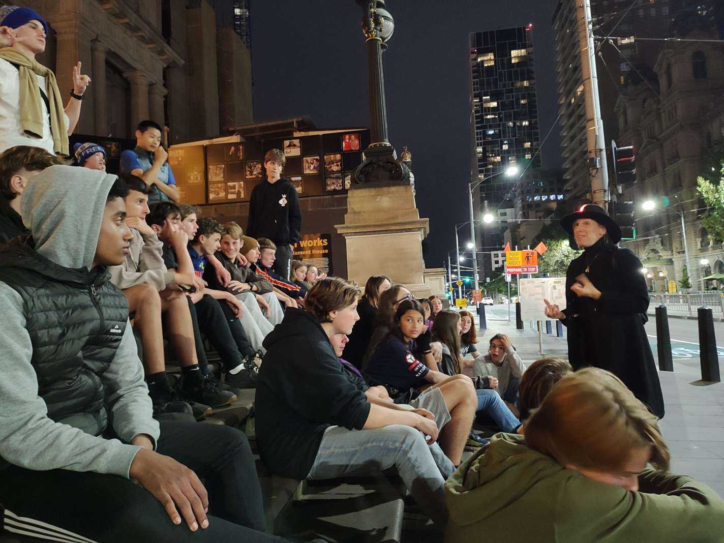 Camp students enjoying a night ghost tour