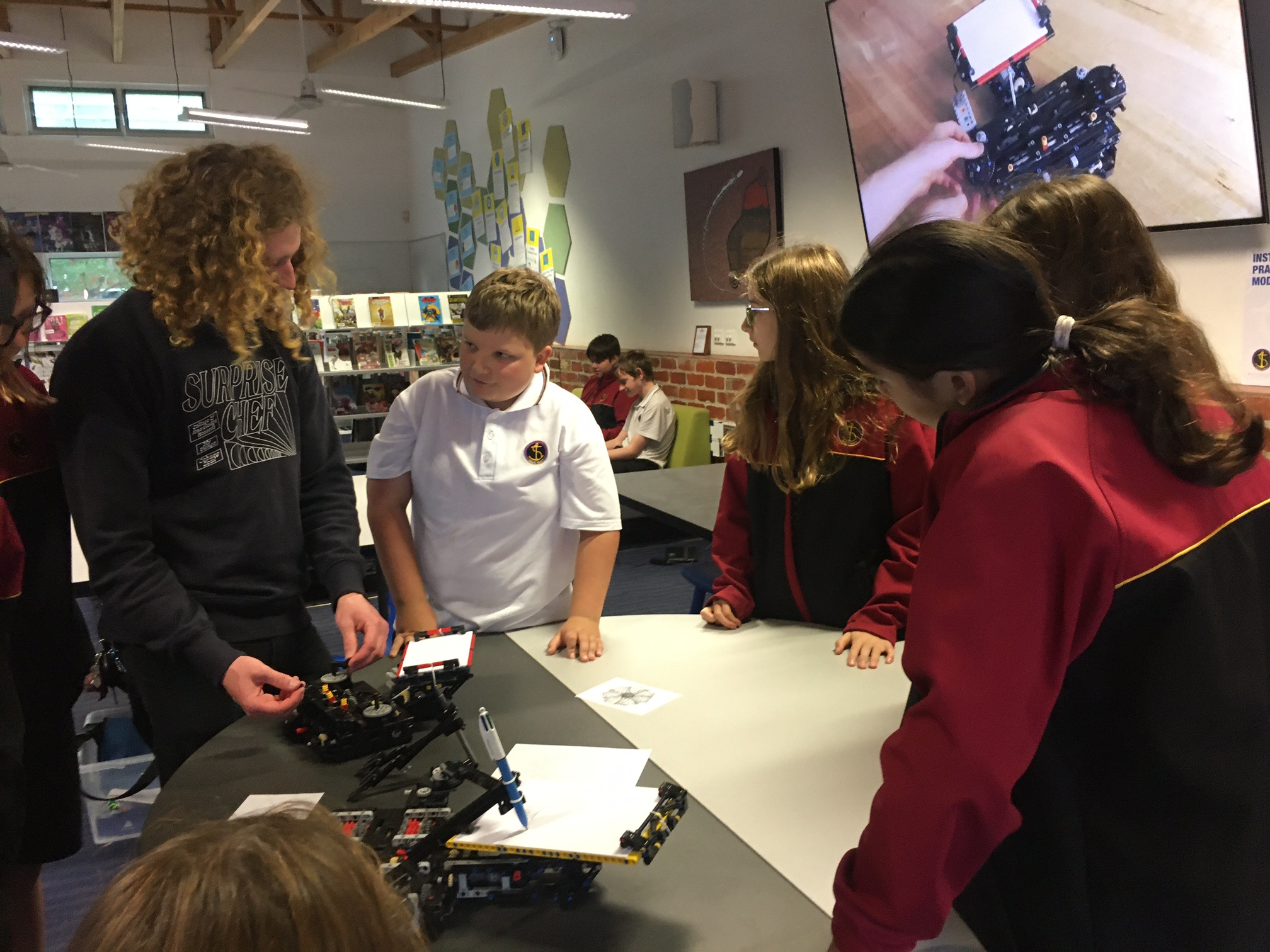 Dillon Jepsen demonstrating some kinetic sculptures with Year 7 students.