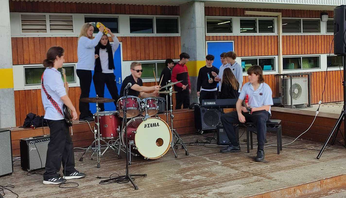 Year 9 Music students performing during Lunch - James Bowers, Mr Wyatt and Archie Miller