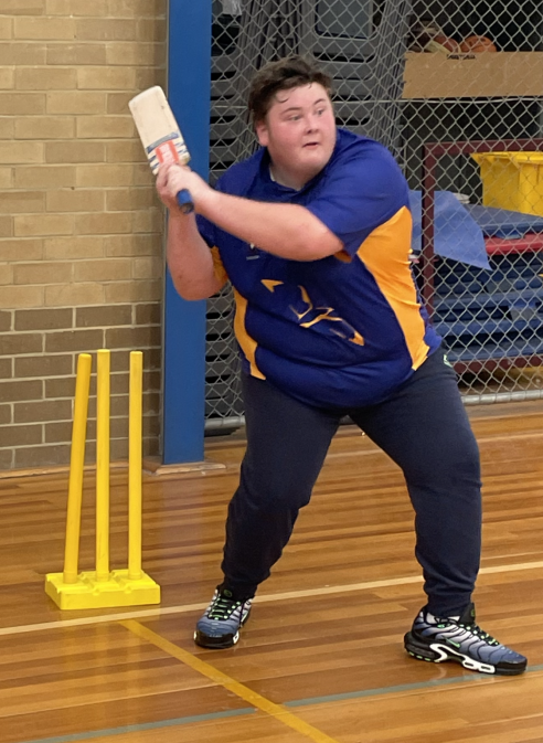 Dallas playing Cricket at Celebration Day