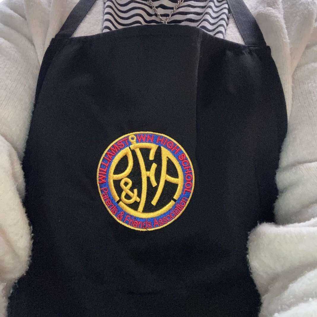 PFA aprons with our new student-designed logo