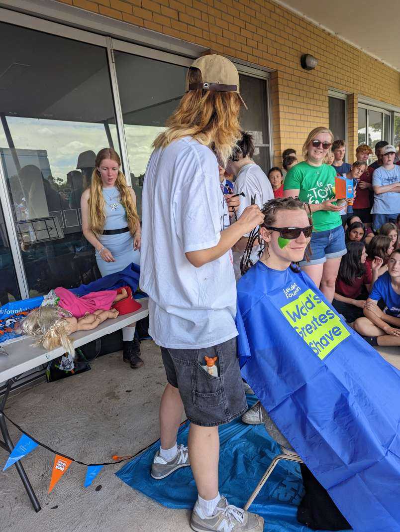 Jesse Holland Gets his head shaved