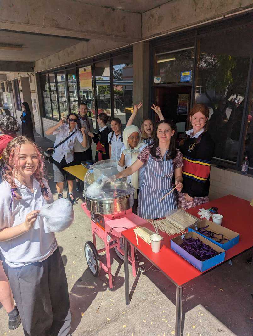 The Leadership team raising money with purple fairy floss on International Women's Day